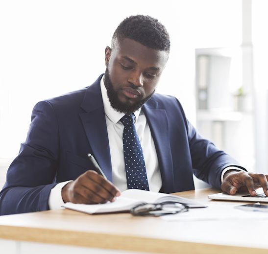 Businessman Taking Notes