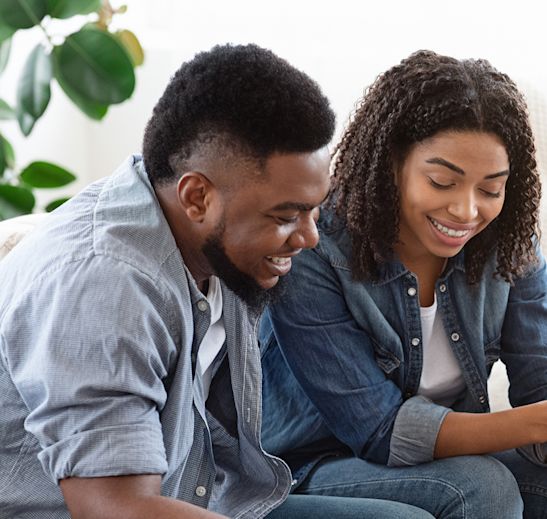people working on a laptop