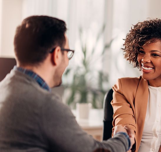 people meeting and shaking hands
