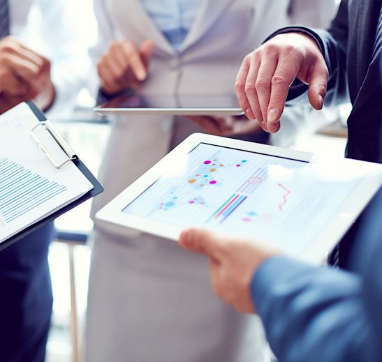 business people with ipads gathering