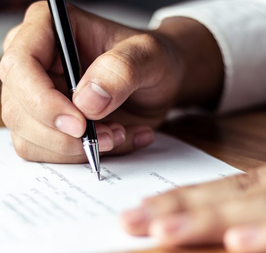 a person filling out a finance form