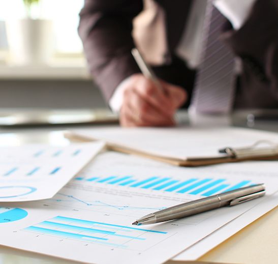 man working on charts