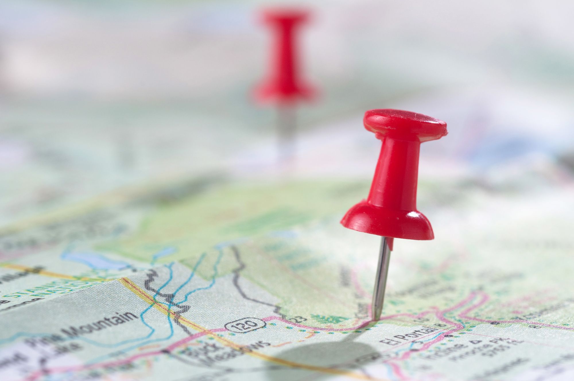 a map with thumb tacks