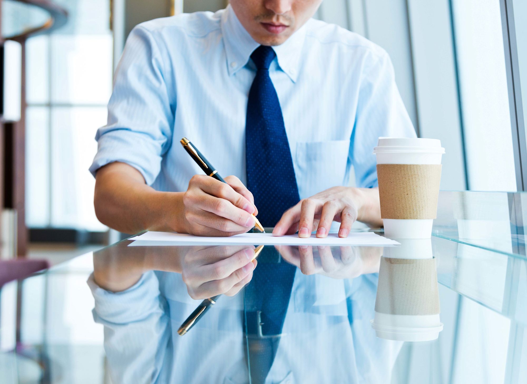 businessman writing