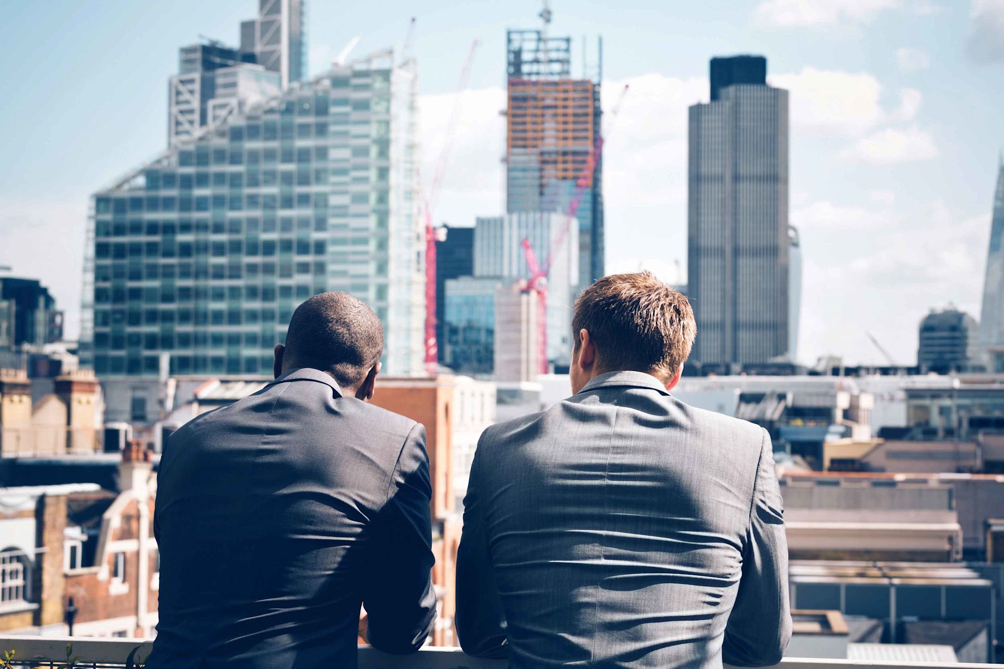 businessmen cityscape istock 000056485648 mencityscape
