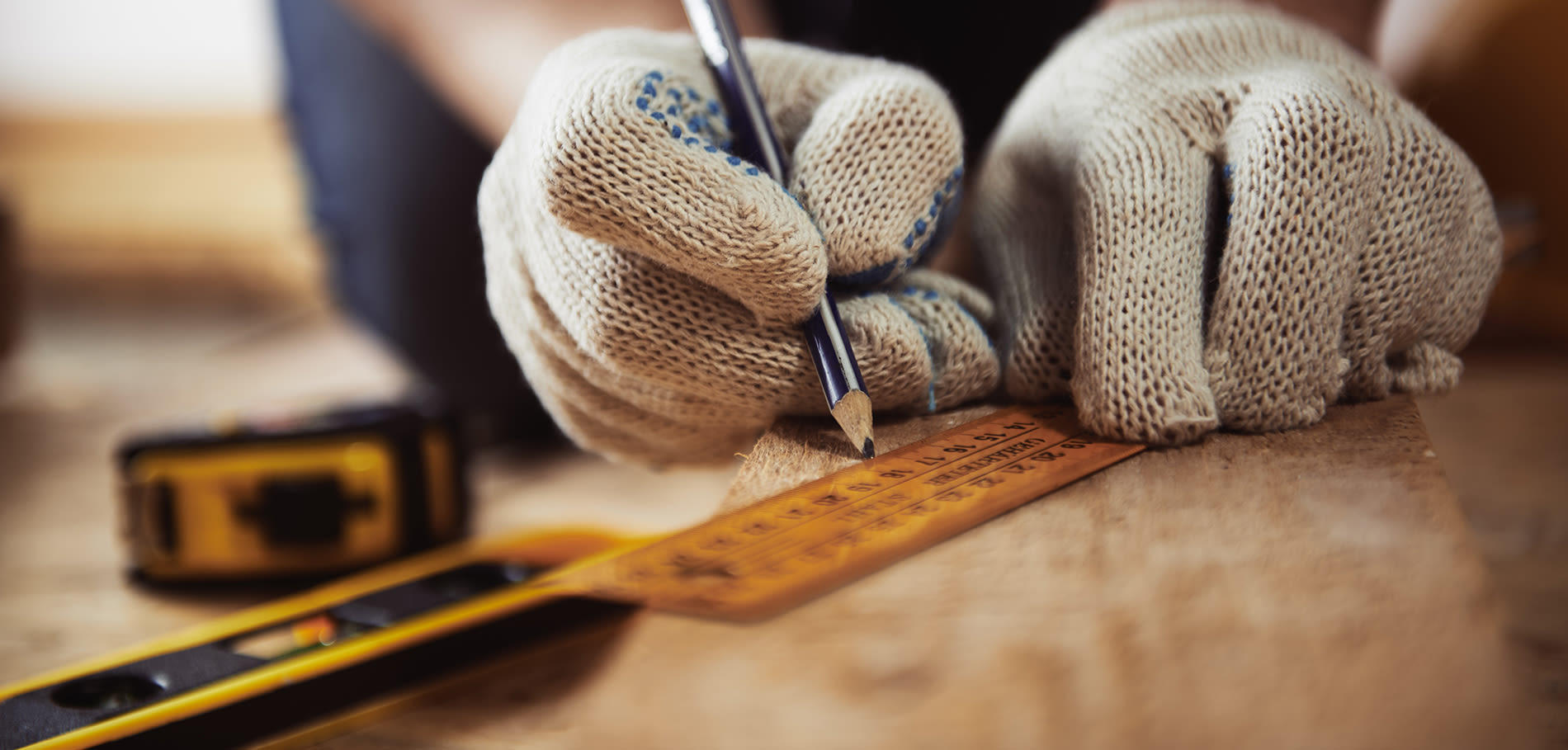 a person using a ruler to measure something