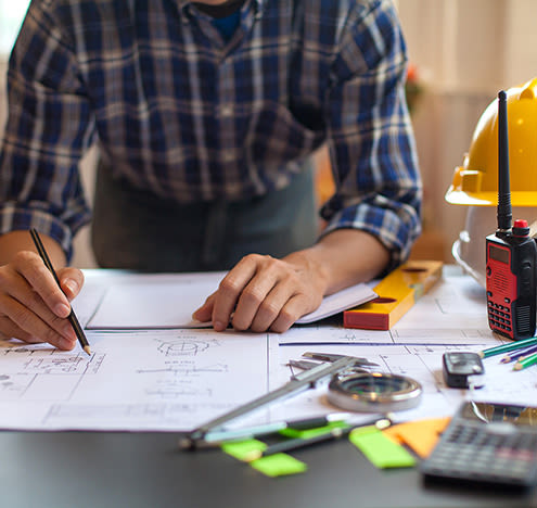 construction worker working on desk