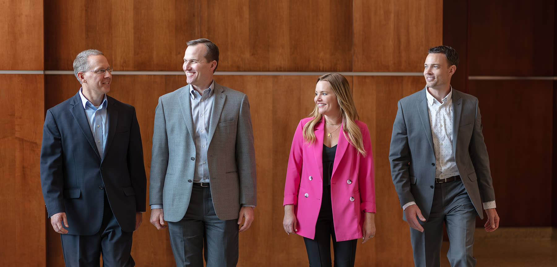 Brian Hagen, Josh Hoesch, Melissa Fellows, and Chris Doering walking
