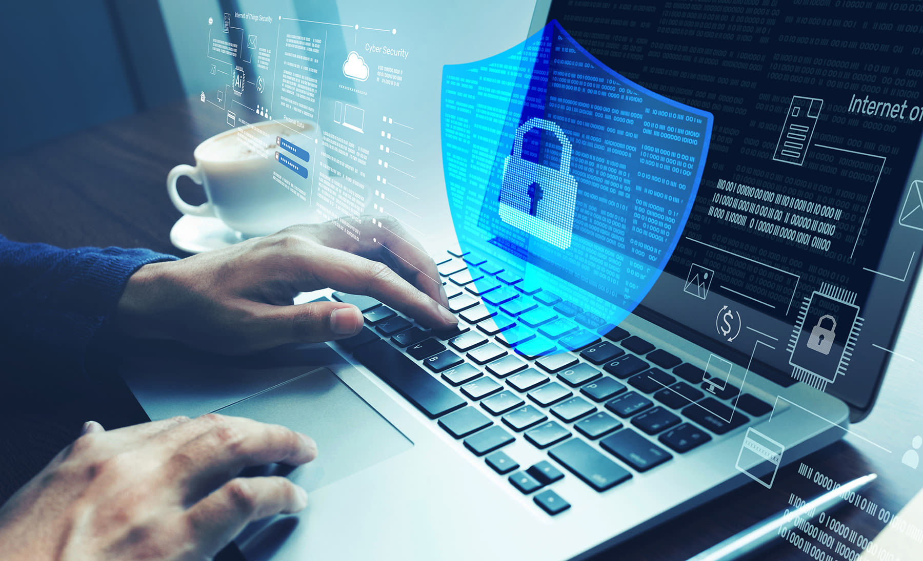 person typing on laptop with a blue security icon overlay
