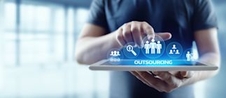 Person using an iPad to outsource financial management