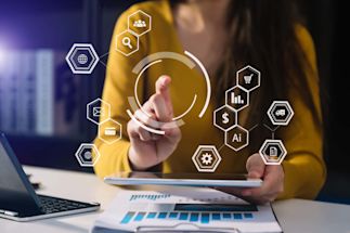 Woman working with touch screen to make electronic payments.