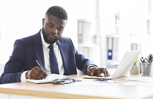 Businessman Taking Notes