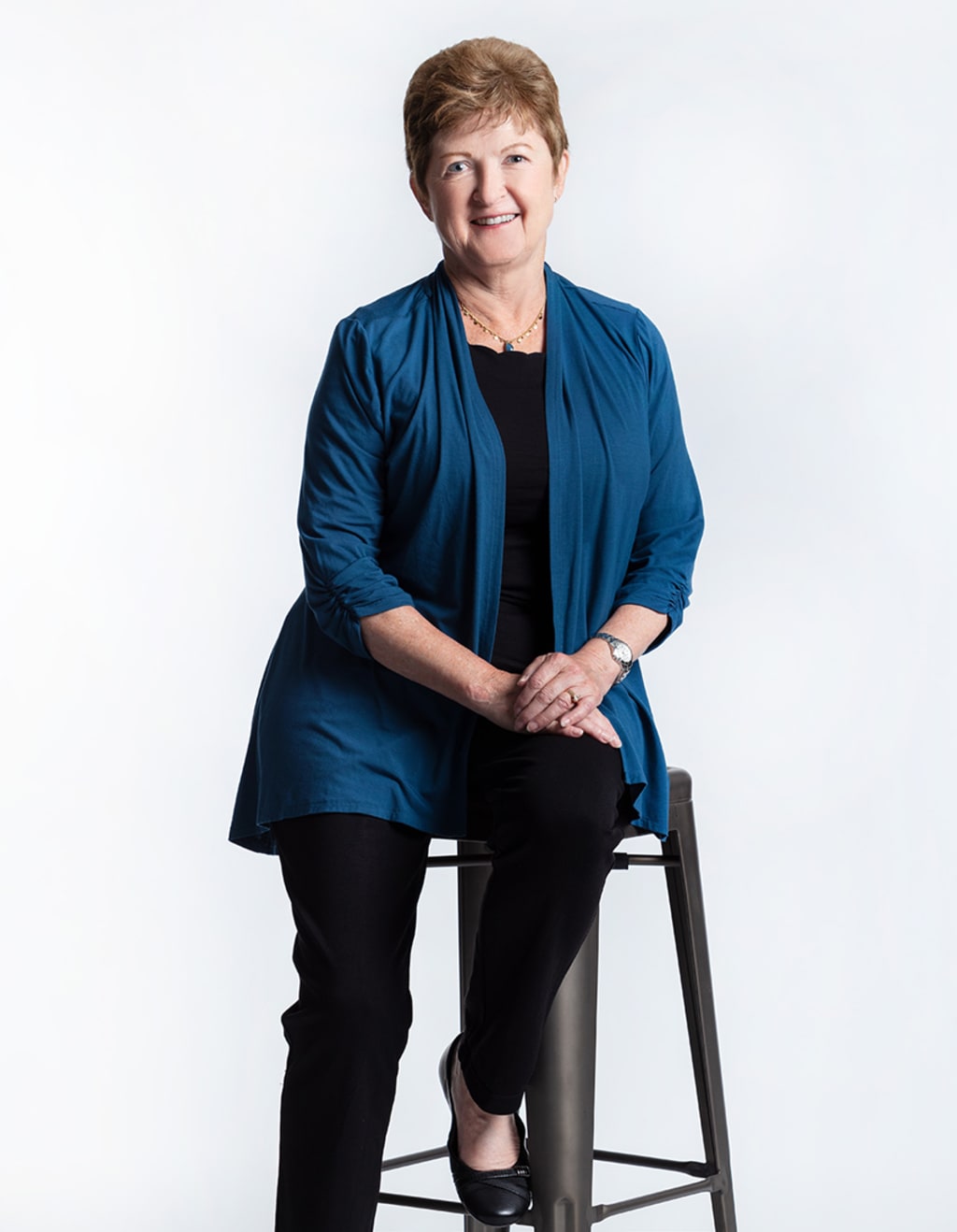 Jan Eddy sitting on a chair