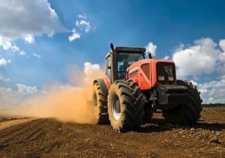 tractor plowing field