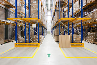 an aisle in a warehouse